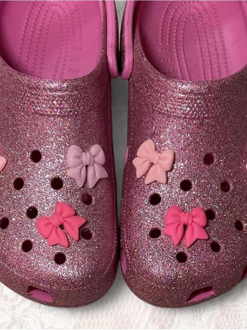 CROCS Women’s Sparkle Pink Glitter Clogs with Bow Jibbitz 10